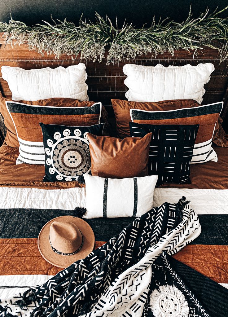 jordanlanehomes 🌿 Boho rust black and white bedroom