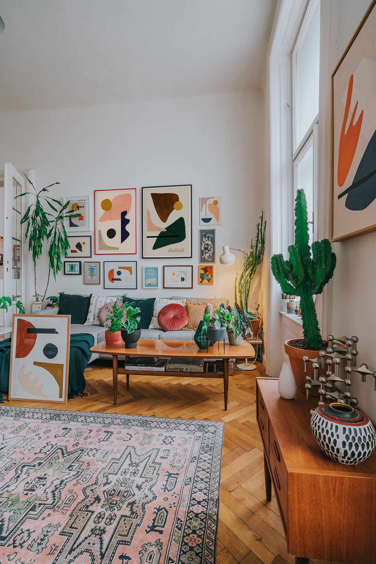 Living room with a large gallery wall Boho living room